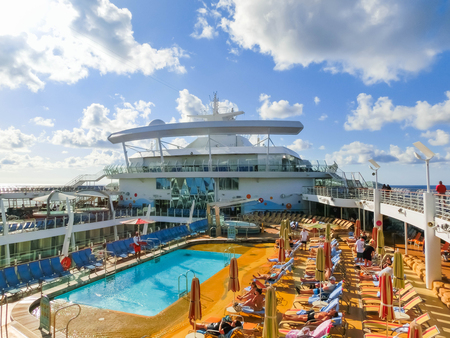 Cape Canaveral, USA - April 29, 2018: The upper deck with swimming pools at cruise liner or ship Oasis of the Seas by Royal Caribbeanのeditorial素材