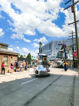 Orlando, USA - May 8, 2018: The people and traditional large parade with performers at Universal Studio park on May 8, 2018のeditorial素材