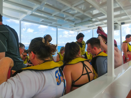 Cozumel, Mexico - May 04, 2018: The people at snorkeling underwater and fishing tour by boat at the...