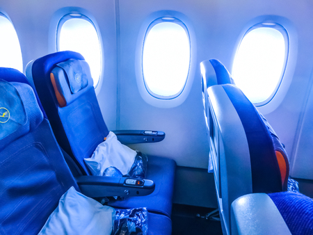 Frankfurt, Germany - April 28, 2018: The people looking for their places and interior of Airbus A380-800 before the flight at Frankfurt, Germany on April 28, 2018.のeditorial素材