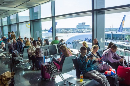 Frankfurt, Germany - April 28, 2018: passengers sitting and waiting for departure inside of Frankfurt Pearson Airport at Frankfurt, Germany on April 28, 2018, Frankfurt handled 57.5 million passengersのeditorial素材