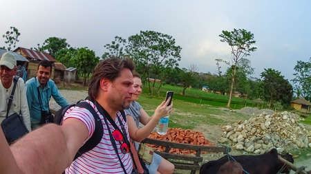 CHITWAN, Nepal - April 09, 2018: The people at bull safari in Chitwan National Park, Nepalのeditorial素材