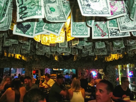 Siesta Key, USA - May 11, 2018: The people at The Siesta Key Oyster Bar at Siesta Key, USA on May 11, 2018のeditorial素材