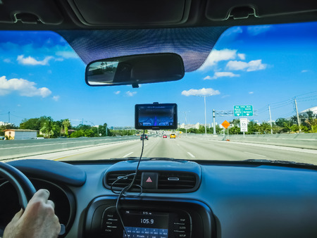 Miami, USA - April 29, 2018: The Navigation system in the car at Miami, USA on April 29, 2018のeditorial素材