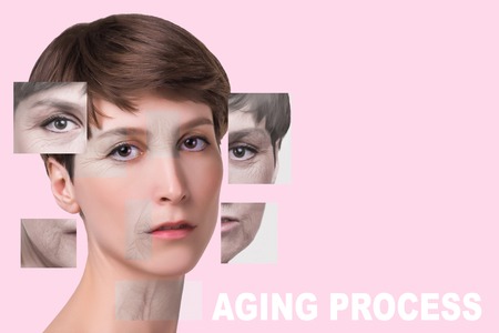 Anti-aging, beauty treatment, aging and youth, lifting, skincare, plastic surgery concept. Beautiful girl with young face and half face of old woman with wrinklesの写真素材