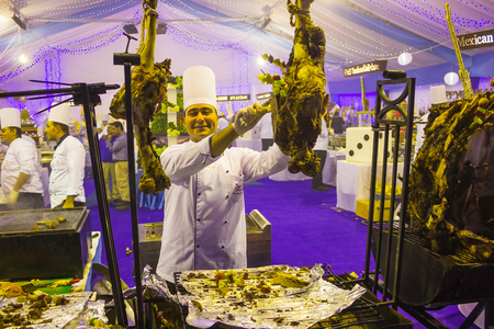 Sharm El Sheikh, Egypt - December 31, 2018: Egyptian cooks standing at hotel restaurant at Xperience Sea Breeze Resort . Egyptian food is a mixture of all the different civilisations that came to Egypt in the history of its existence.のeditorial素材