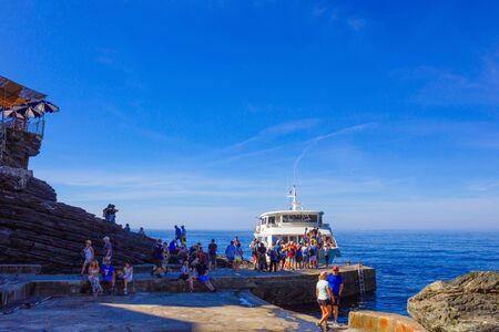 Vernazza, Italy - September 14, 2019: scheduled boat passengers prepare for departure
