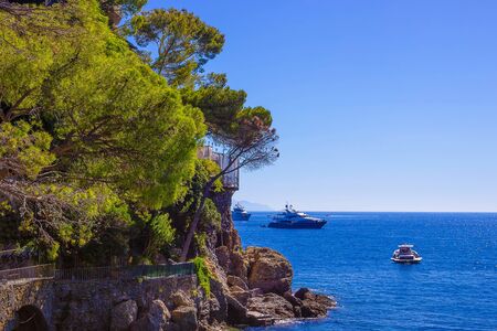 The beach near portofino in genoa on a blue sky and sea backgroundの写真素材