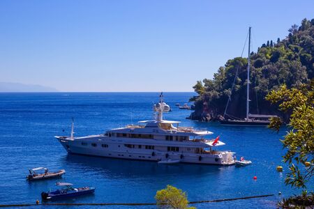 The beach near portofino in genoa on a blue sky and sea backgroundの写真素材