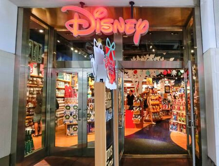 Miami, USA - November 30, 2019: The colorful princesses at Disney store indoor shopping mall Bayside marketのeditorial素材