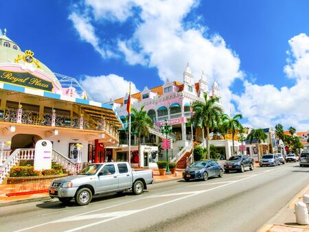 Oranjestad, Aruba - December 4, 2019: Street view of busy tourist shopping district in Caribbean cityのeditorial素材