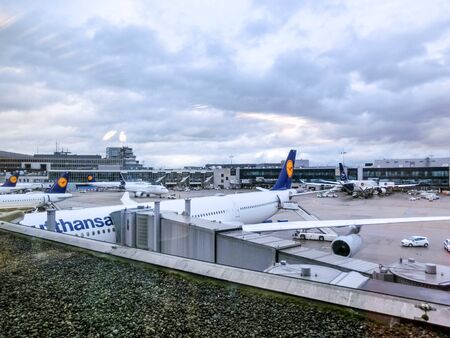 Frankfurt am Mine, Germany - November 28, 2019: Aircraft standing near the terminal