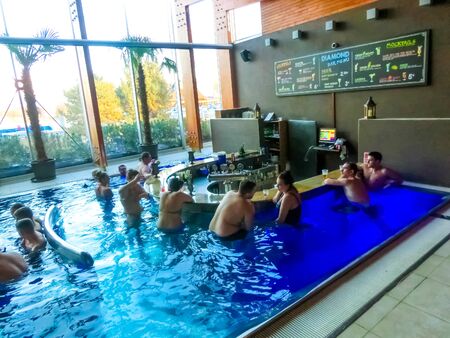 Poprad, Slovakia - December 31, 2019: People resting at Waterpark AquaCity in Popradのeditorial素材