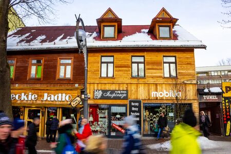 Zakopane, Poland - January 2, 2019: People walking at Krupowki street in Zakopaneのeditorial素材