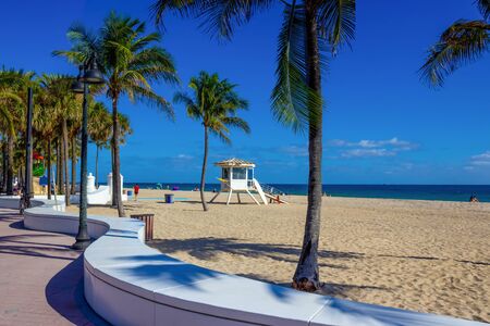 Fort Lauderdale beach near Las Olas Boulevard with the distinctive wall in the foreground.の写真素材