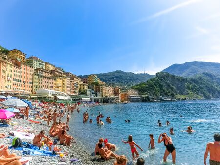 Camogli, Italy - September 15, 2019: People resting at beach at Camogli on sunny summer day, Liguria, Italyのeditorial素材