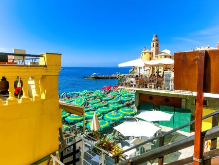 The sea and beach at Camogli, Italy on sunny summer day, Liguriaの写真素材