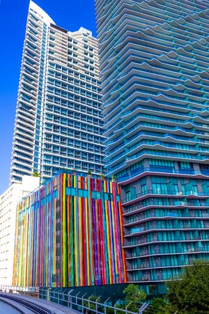 Miami, USA - November 30, 2019: Downtown Miami cityscape view with condos and office buildings against blue sky.のeditorial素材