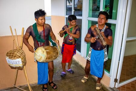 Colon, Panama - December 8, 2019: View of local men welcoming tourists at port at Colon, Panama on December 8, 2019のeditorial素材