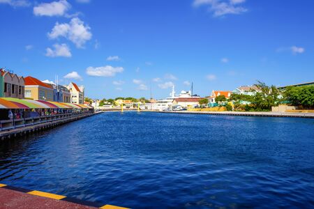 Willemstad, Curacao, Netherlands - Specific coloured buildings at street in Curacaoの写真素材