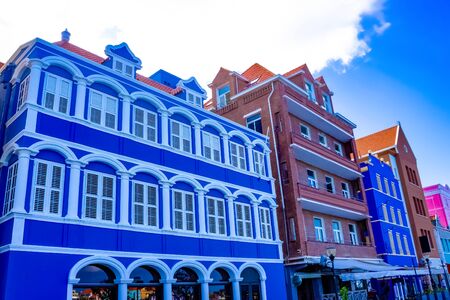 Willemstad, Curacao, Netherlands - Specific coloured buildings at street in Curacao