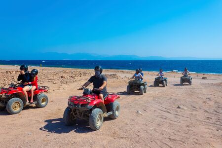 Sharm El Sheikh, Egypt - February 17, 2020: The people at quad tour in the desert in Egypt on vacation panoramaのeditorial素材