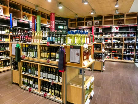 Genoa, Liguria, Italy - September 11, 2019: The wine shellves at supermarket COOP at Genova, Italyのeditorial素材