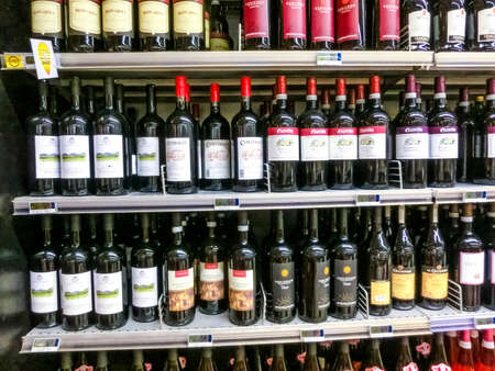 Genoa, Liguria, Italy - September 11, 2019: The wine shellves at supermarket COOP at Genova, Italyのeditorial素材