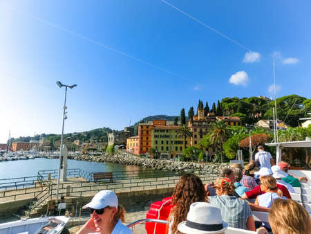 Santa Margherita Ligure, Italy - September 17, 2019: The people at boat tour and view from ship of town Rapallo in Liguria, Italy.のeditorial素材