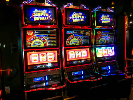 Half Moon Cay island, Bahamas - December 4, 2019: Casino interior, gaming slot machines, American...