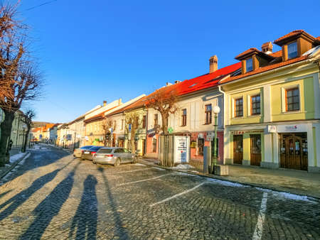 Kezmarok, Slovakia - January 01, 2020: Colourful houses on the Main street of Kezmarok, Slovakia, a small town in Spis region, Poprad river.のeditorial素材