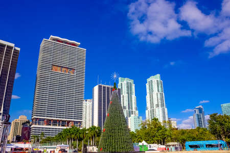 Miami, USA - November 30, 2019: Downtown Miami cityscape view with condos and office buildings against blue sky.のeditorial素材