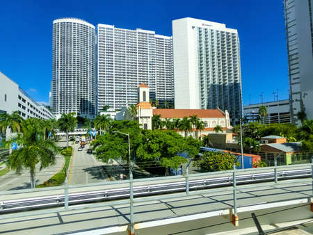 Miami, USA - November 30, 2019: Downtown Miami cityscape view with condos and office buildings against blue sky.のeditorial素材