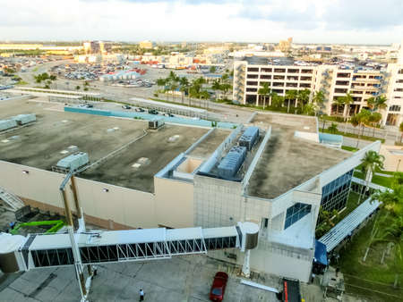 Fort Lauderdale - December 1, 2019: The view from a cruise ship of terminal at Port Everglades, in Ft. Lauderdale, Florida of the channel and beach.のeditorial素材