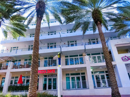 Miami, USA - November 29, 2019: The view of hotel from road at sunny day at Ocean Drive at Miami beach.のeditorial素材