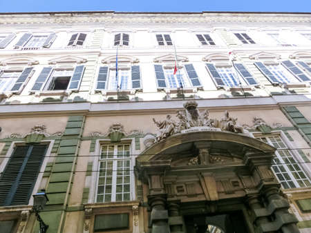 Genoa, Liguria, Italy - September 11, 2019: Facades of old Italian buildings in old part of town, windows with shutters, old building in Genoa, Italy.のeditorial素材