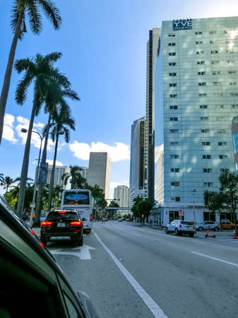 Miami, USA - November 30, 2019: Downtown Miami cityscape view with condos and office buildings against blue sky.のeditorial素材