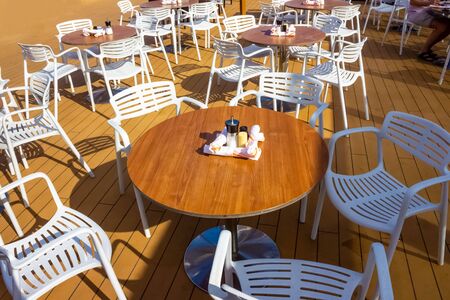 The outdoor Dining Room Buffet aboard the abstract luxury cruise ship. breakfast with sea viewの写真素材