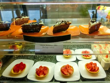 Dining Room Buffet aboard the abstract luxury cruise ship. Cakes and mousses