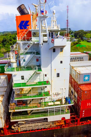 Panama Canal, Panama - December 7, 2019: A cargo ship entering the Miraflores Locks in the Panama Canal, in Panamaのeditorial素材