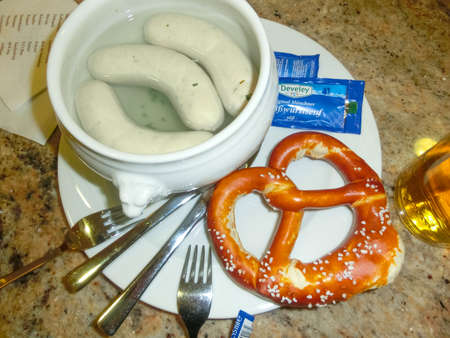 Munich, Germany - May 16, 2016: The bavarian sausages in the food court in the munich airport at Munich, Germany on May 16, 2016のeditorial素材