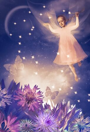 Beautiful girl as blue fairy - night glamour portrait with moon. Concept of dreamsの写真素材