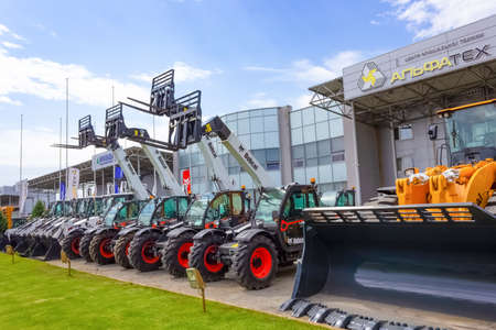 Kyiv, Ukraine - June 16, 2020: Skid steer loader Bobcat at road at Kyiv, Ukraine on June 16, 2020
