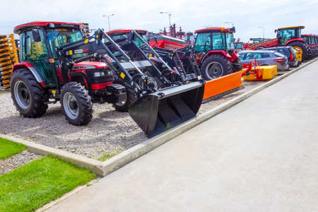 Kyiv, Ukraine - June 16, 2020: Mahindra agricultural heavy machinery equipment parked on the street...