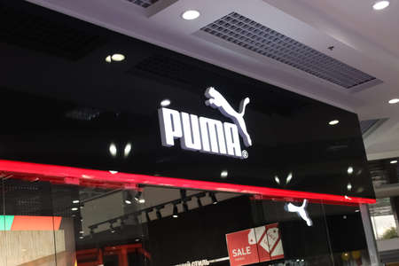 Kiyv, Ukraine - August 2, 2020: Puma logo on a facade of store. Puma is a major german multinational company that produces athletic, casual footwear, sportswear, headquartered in Bavaria, Germanyのeditorial素材