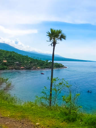 Agung volcano is the highest mountain on Bali island, Indonesia. It is still active and located near...
