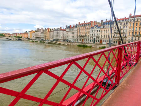 Bridge across river Rhone on winter sunny day, Lyon, France