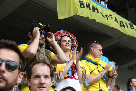 Lyon, France - June 16, 2016: The Ukrainian fans at opening ceremony before UEFA EURO 2016 game of Ukraine against N. Ireland. Stade de Lyon, Lyon, Franceのeditorial素材