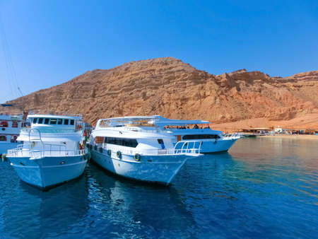 Pleasure yachts in the port for cruise at Ras Mohammed National Parkの写真素材