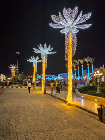 Sharm El Sheikh, Egypt - September 13, 2020: SOHO Square. Luminous palm trees and a sign at the entrance to Soho, Egypt at Sharm El Sheikh, Egypt - September 13, 2020のeditorial素材